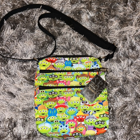 NWT Loungefly Toy Story Alien Outfits AOP Passport Bag - Picture 4 of 5